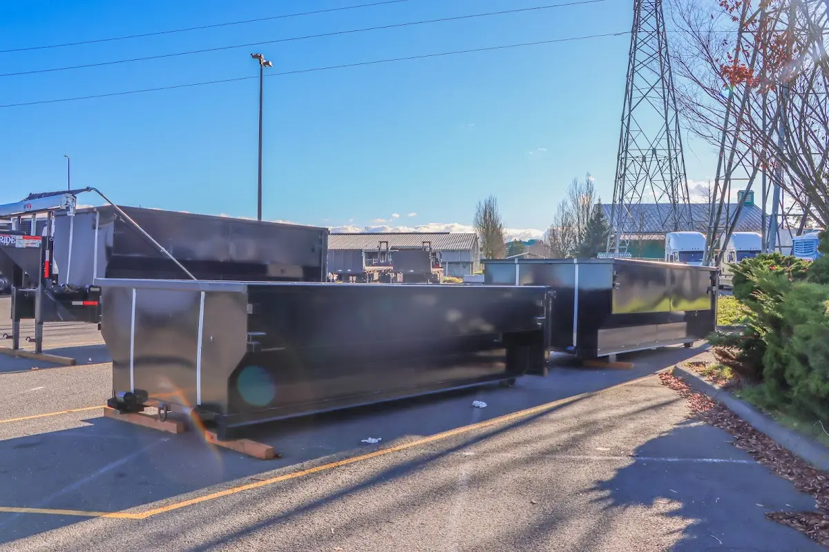Roll-off dumpster ready for waste disposal at job site for 2 Yard Dumpster Rental in Waterboro